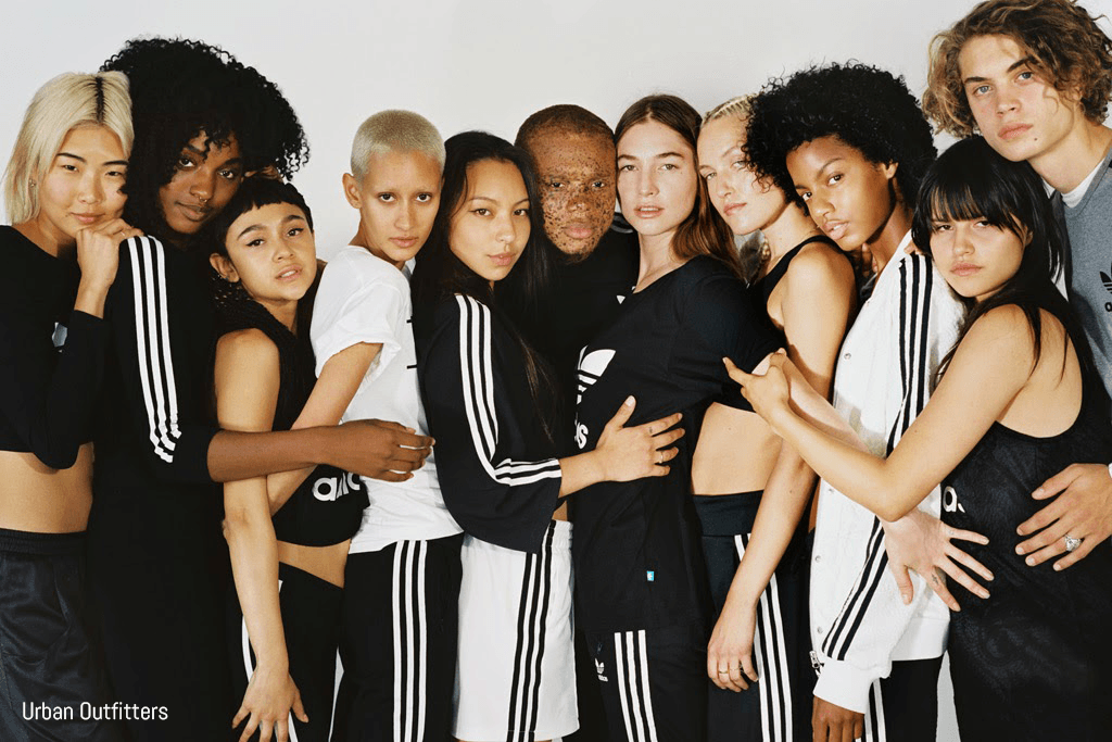 Models pose for Urban Outfitters x Adidas campaign
