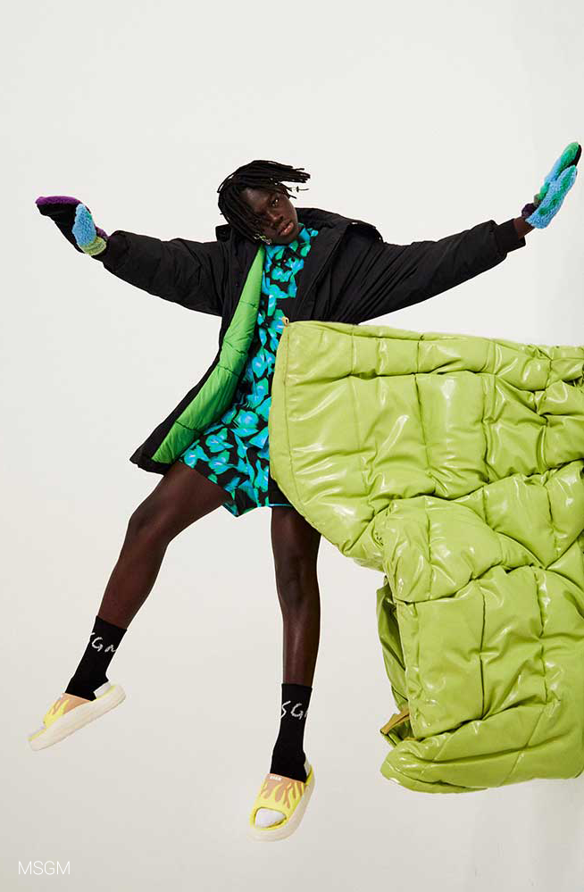 Model jumps in a joyful pose for MSGM FW22